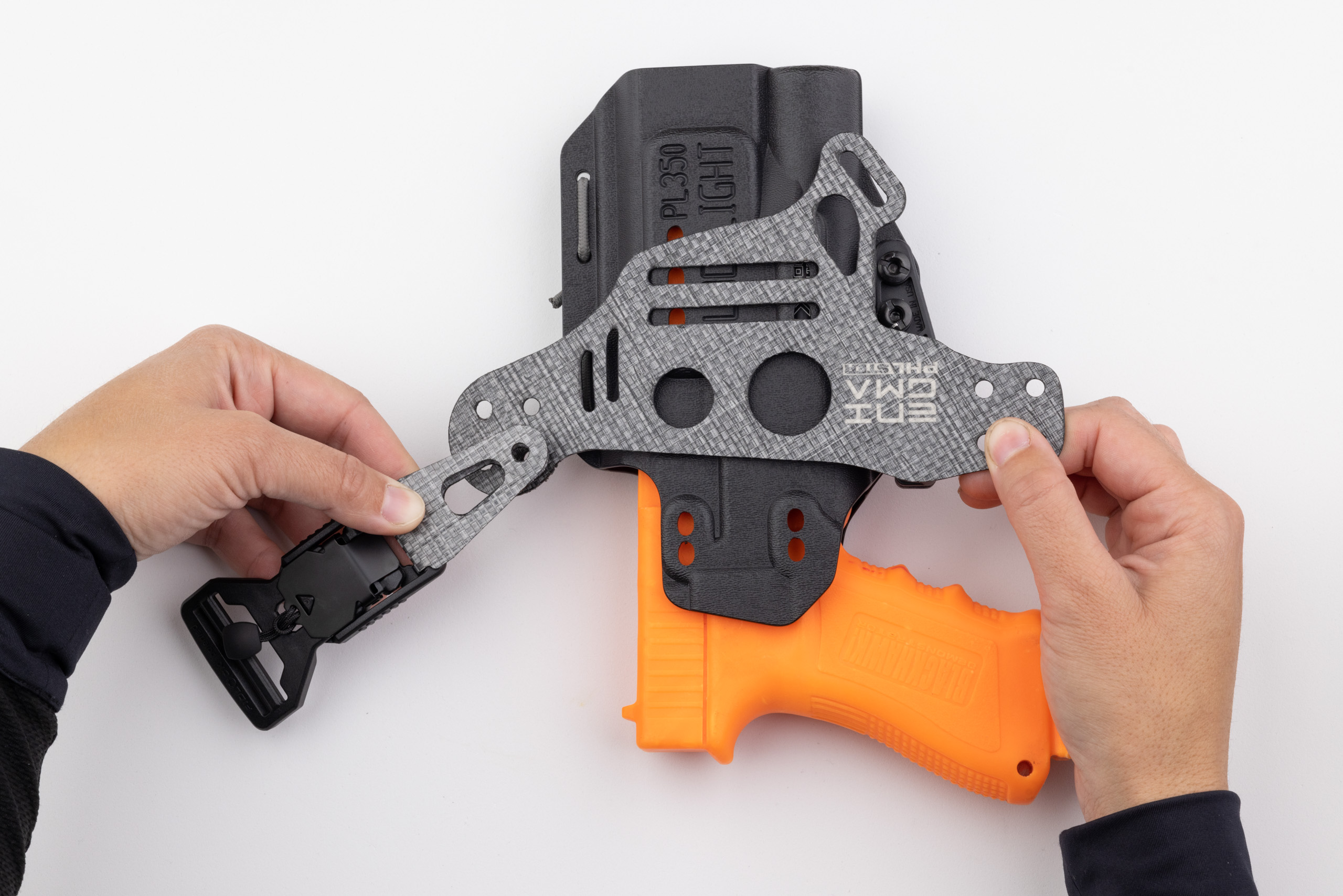 Photo showing buckle attached to left side of Enigma faceplate.