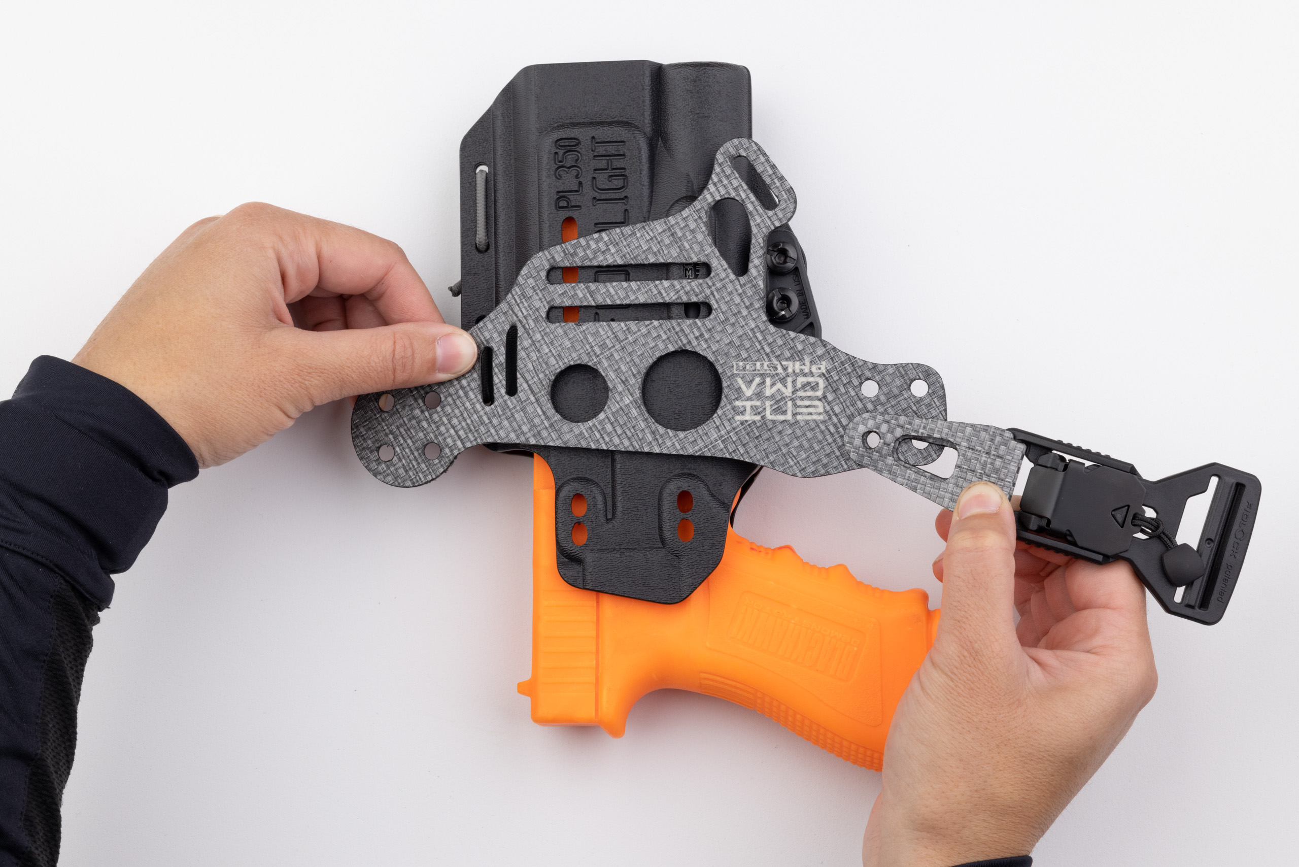 Photo showing buckle attached to right side of Enigma faceplate.