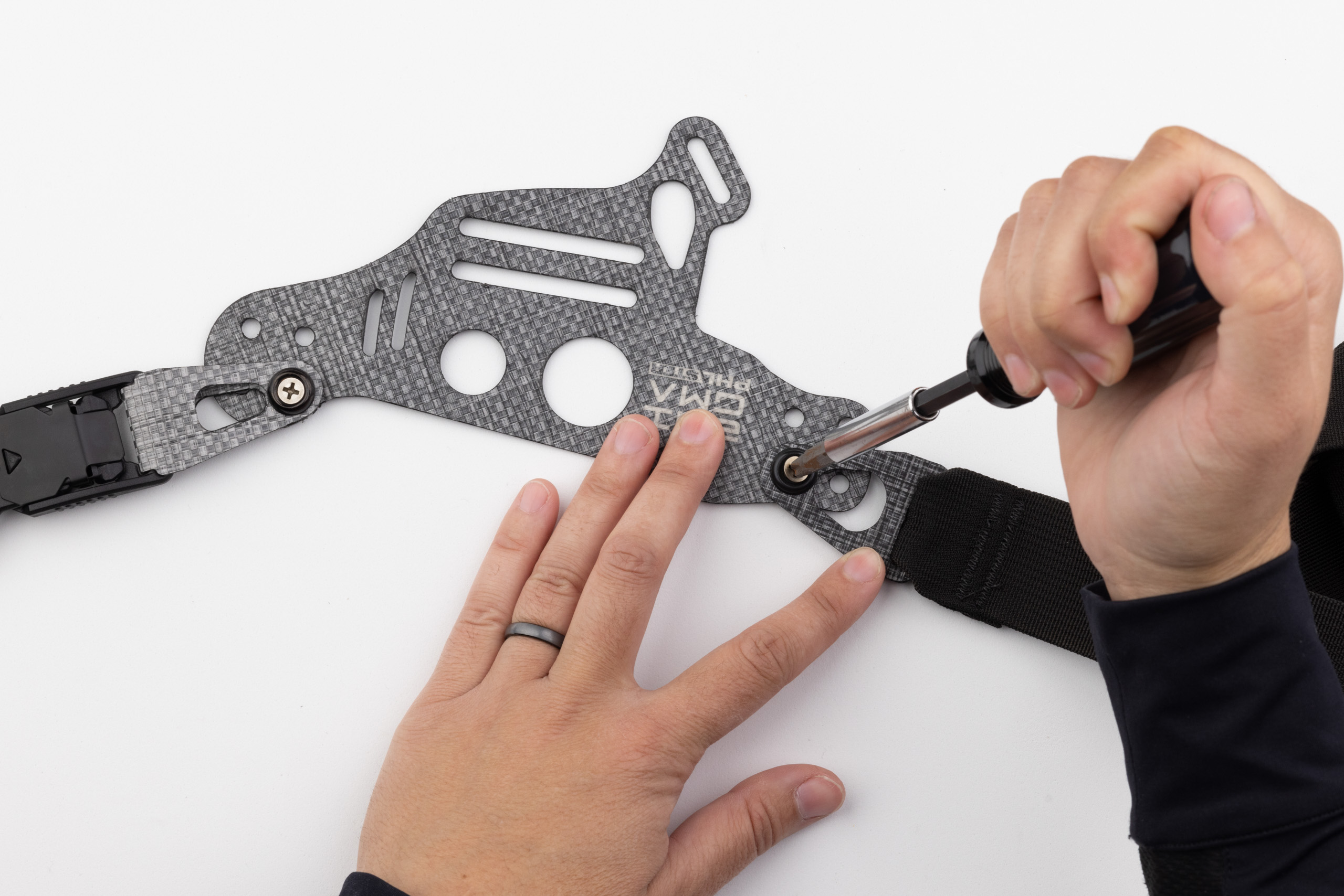 Photo of best technique to tighten PHLster Enigma screws.