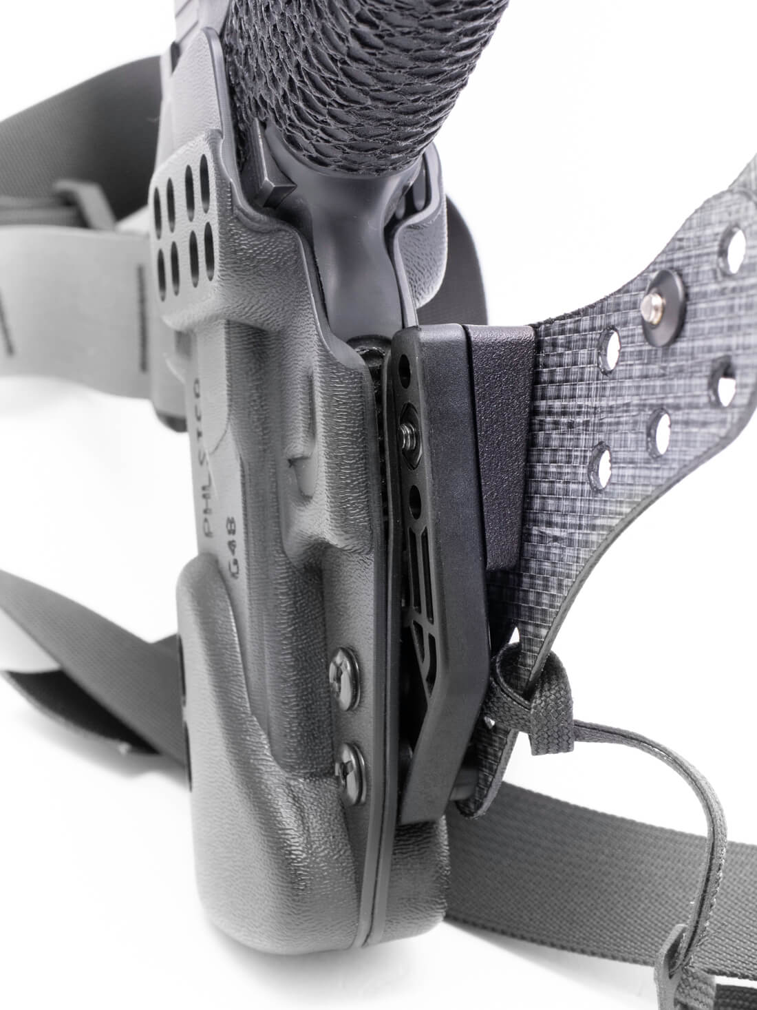 Photo showing how the angled eMod insert smooths the attachment between the holster and the Enigma faceplate.