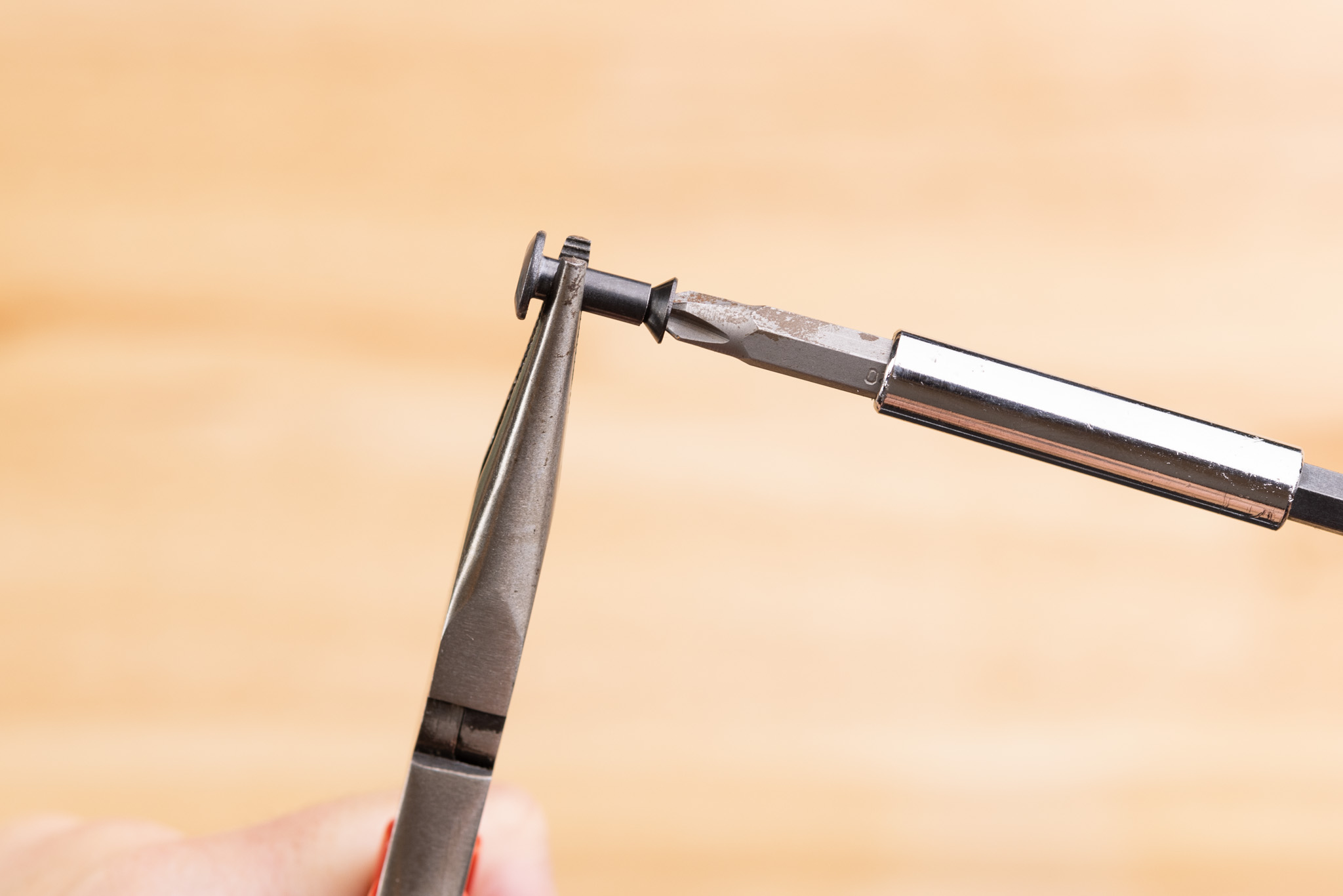 Photo of screw tightened into post.