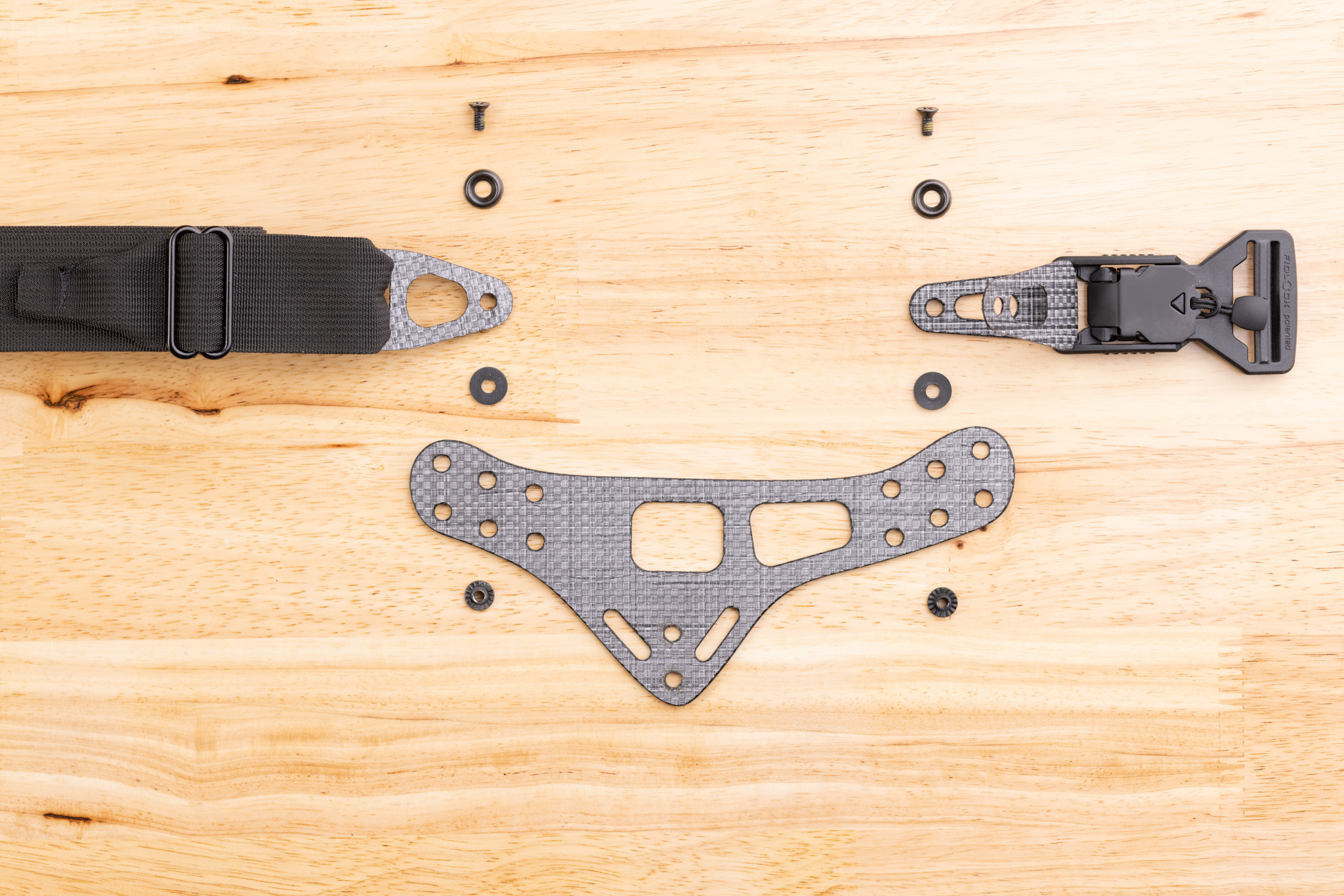 Photo of Enigma, belt, and buckle showing hardware stack order.