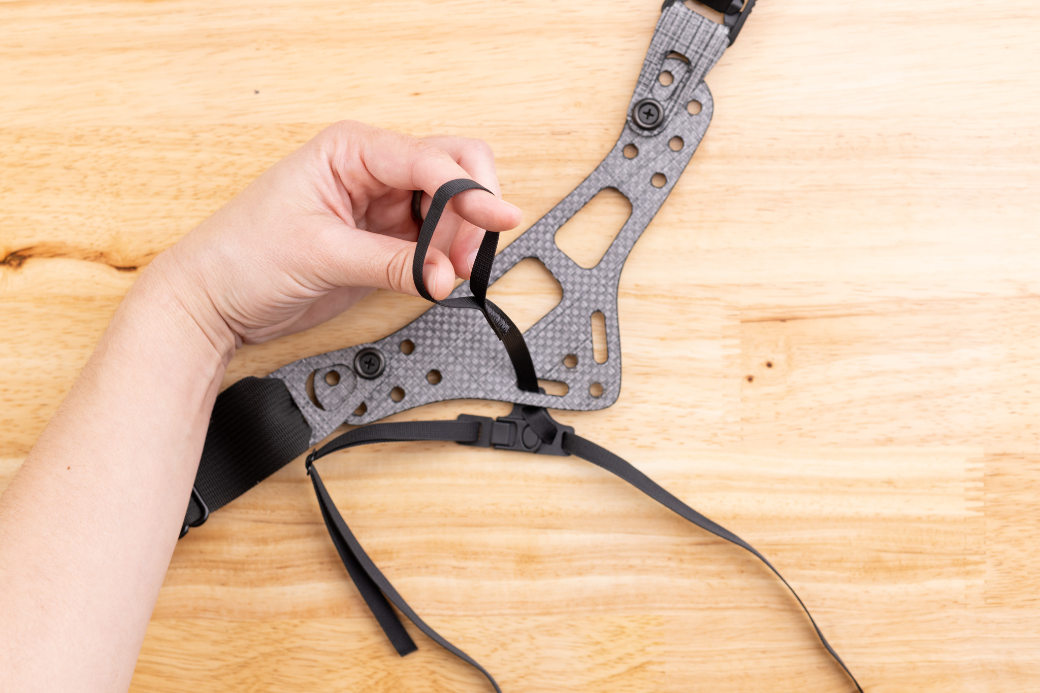 Photo of leg leash passing through Enigma faceplate.