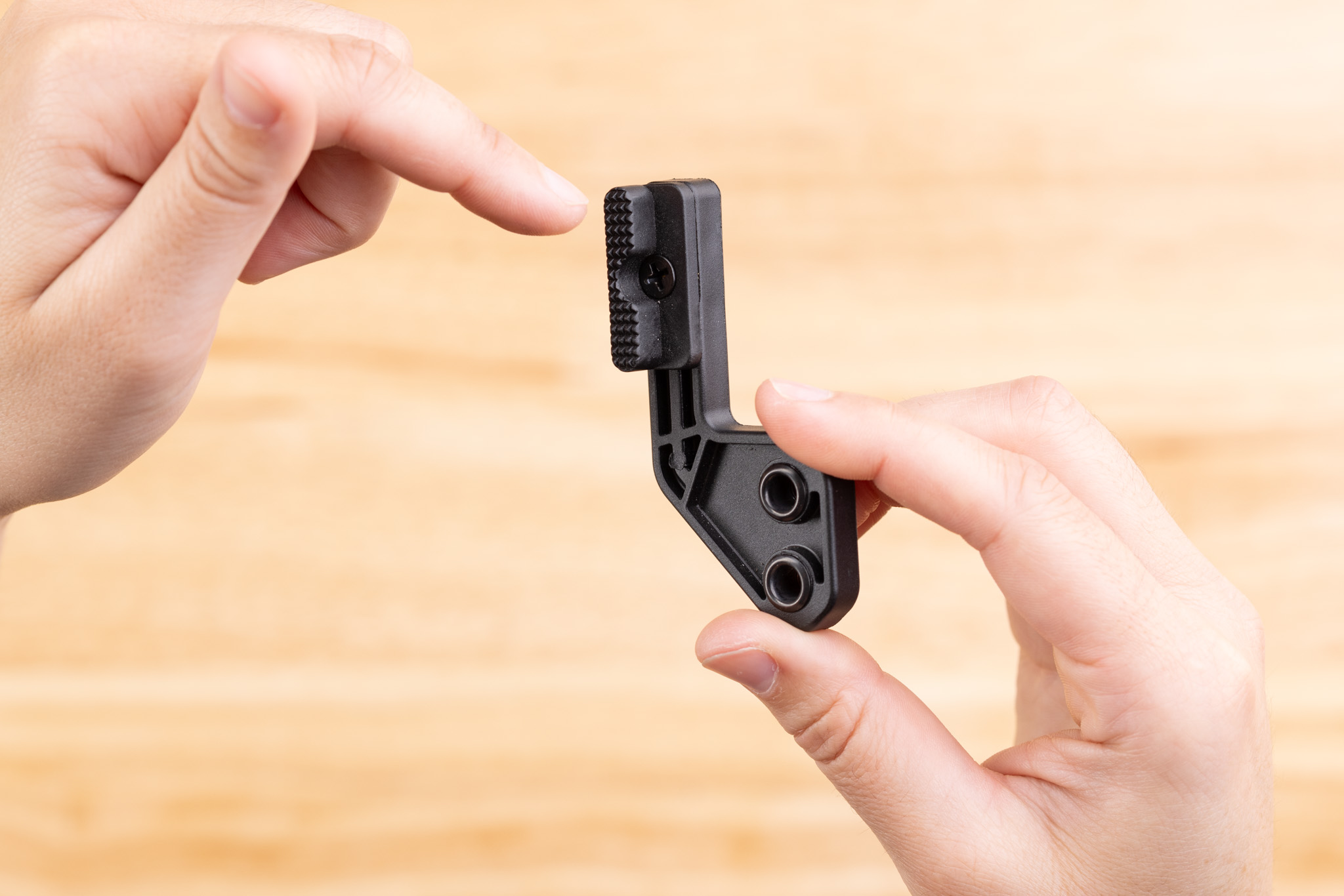 Photo of Modwing with finger pointing at the insert.