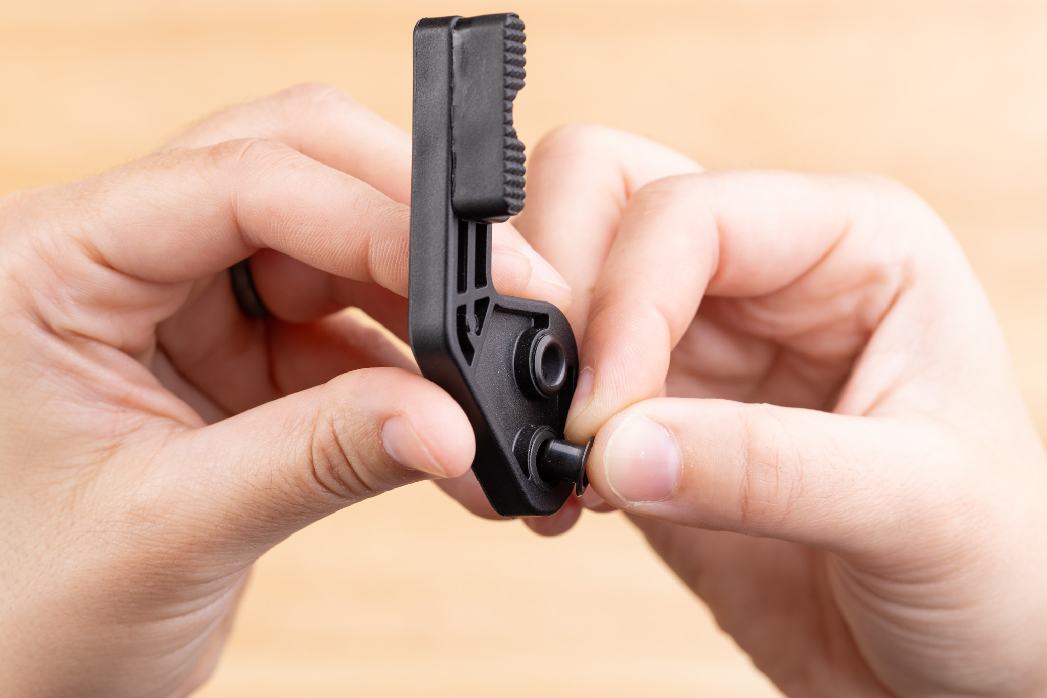 Photo of required eyelets being inserted into Modwing.