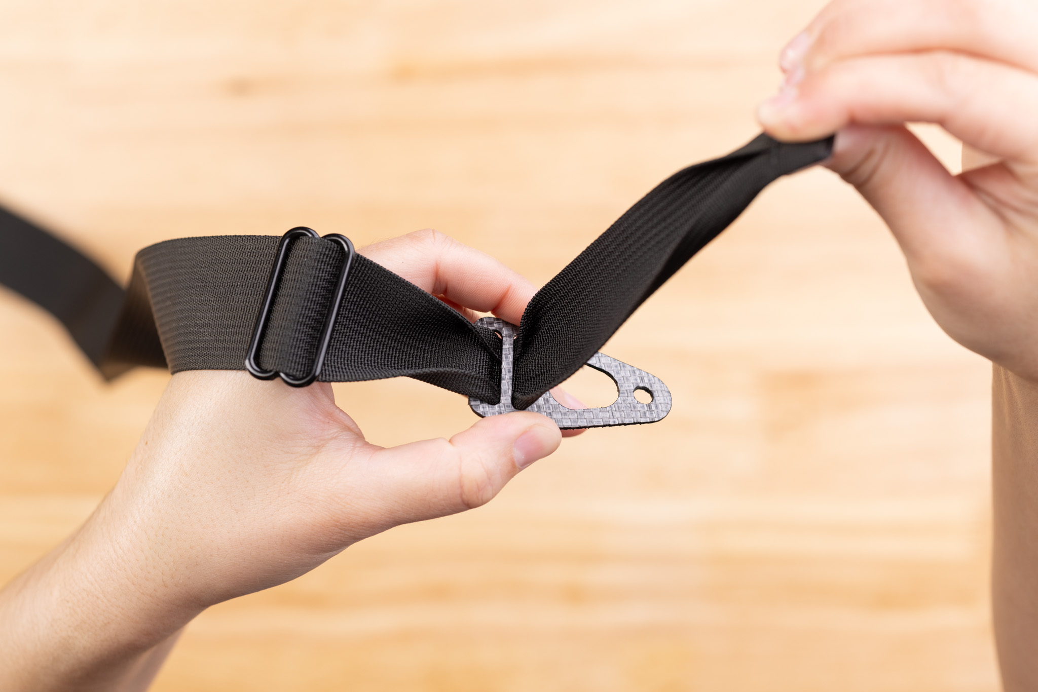 Photo of webbing routing through Enigma belt end.