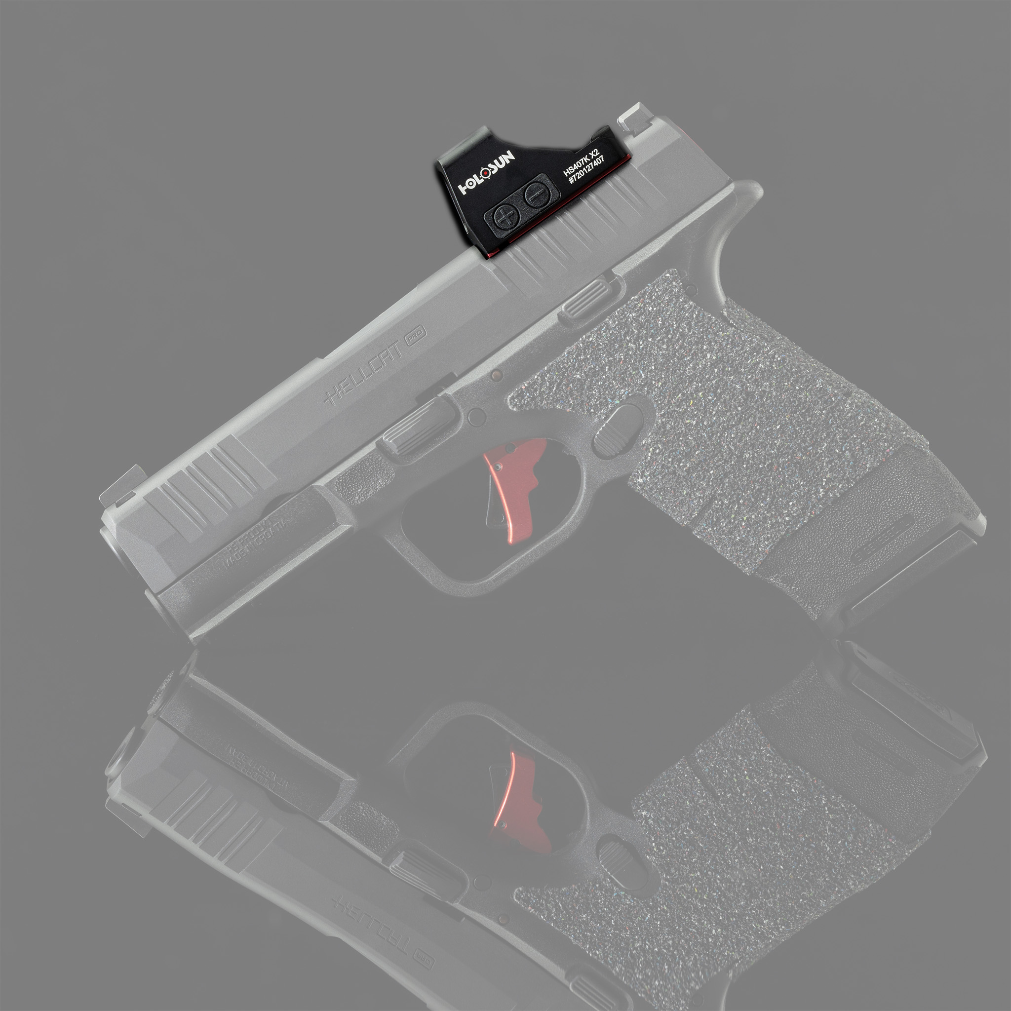 Photograph of LTT Hellcat with red dot optic.