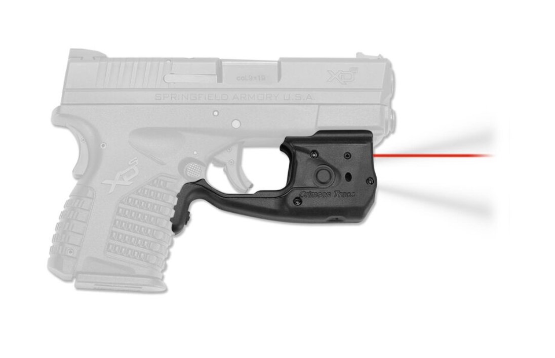 Photo of gun with laser.